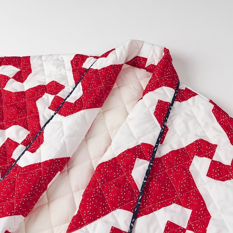 Quilted jacket for ladies with modern geometric pattern and open cut Lune London