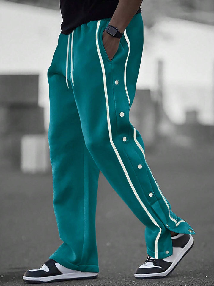 Stylish men's sports pants with snap button details and side pockets Lune London