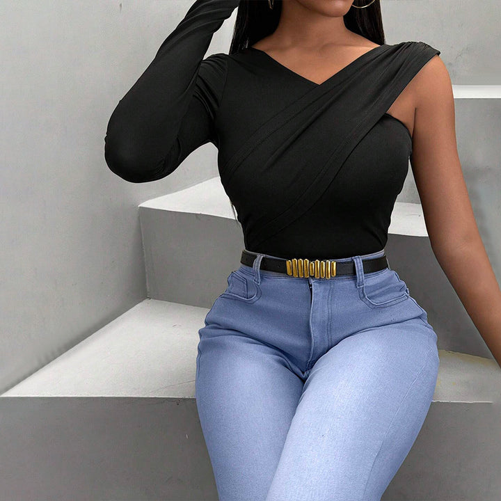 Body à manches longues pour femmes avec coupe asymétrique et design élégant en torsion Chic & Stil
