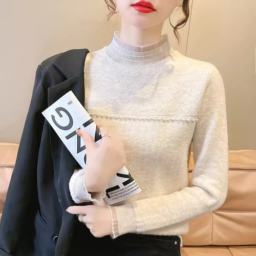 Ladies elegant knitted sweater with transparent inserts and ruffle details Amarae