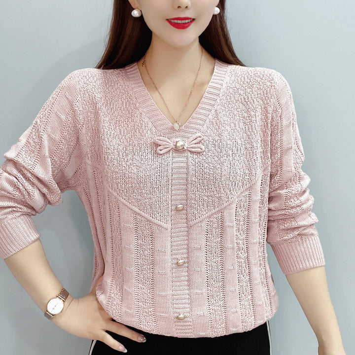 Women knit top with decorative pearl buttons and a refined bow design Lune London
