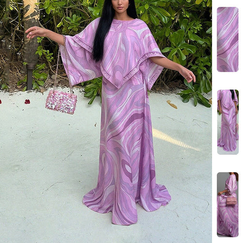 Robe maxi grande taille pour femme avec coupe fluide et design asymétrique Chic & Stil
