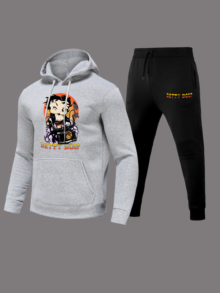 Ladies modern outfit hoodie sweater and casual jogger pants with chic cartoon drawing artistic print