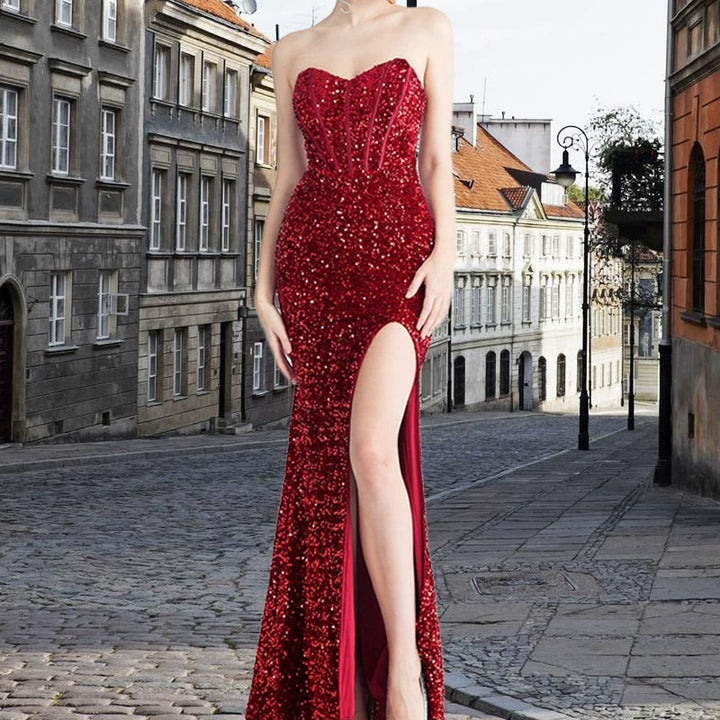 Women's glamorous evening dress with off-shoulder design and shimmering sequins Lune London