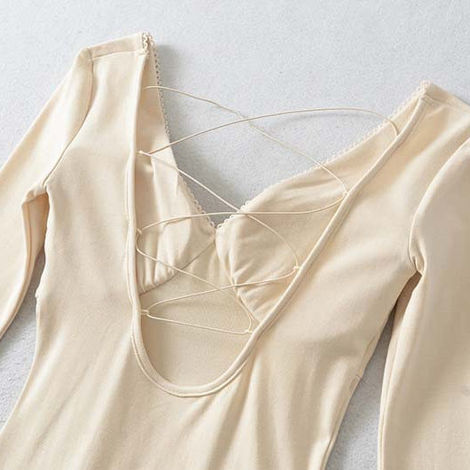 Ladies form-fitting mini dress with a deep V-neckline, gathered bust, and crossed back straps Amarae