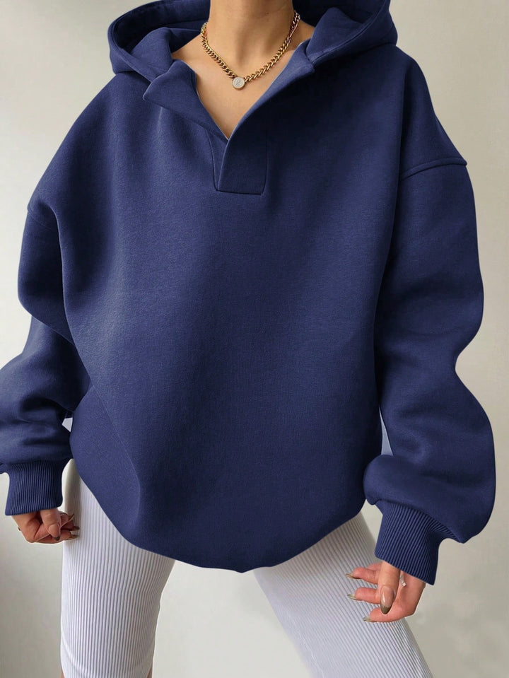 Casual women's top with high collar and oversized cut Lune London