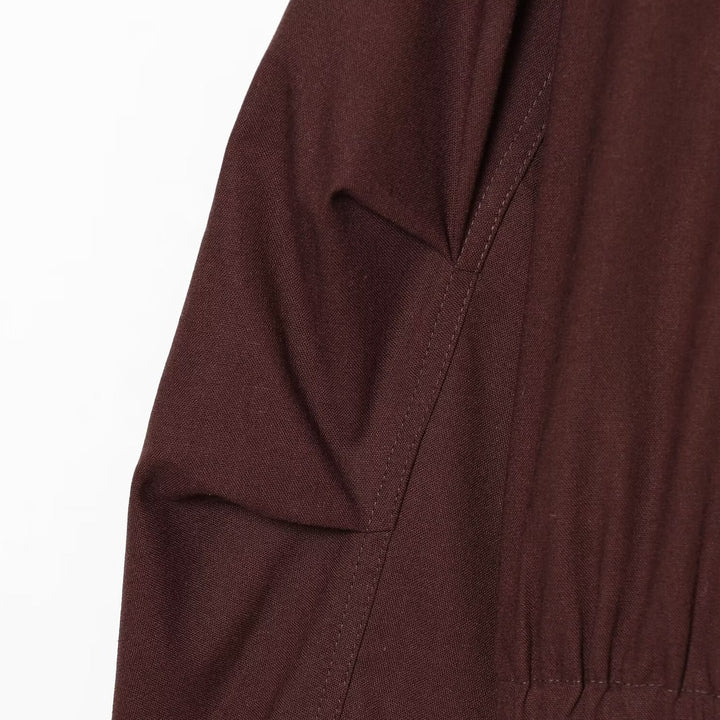 Women's short bomber-style jacket with high funnel collar, concealed zipper, and flap pockets Amarae