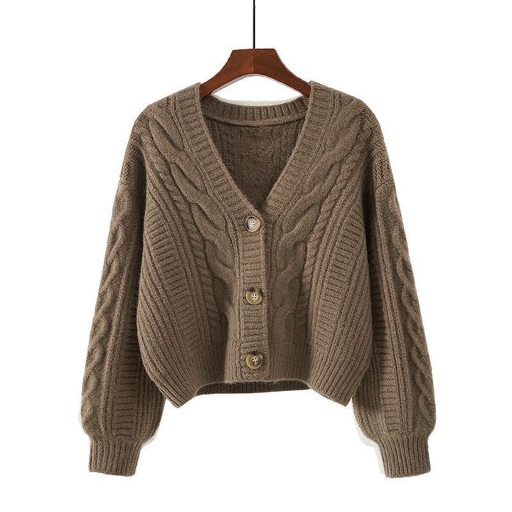 Ladies cozy knitted pullover with cable pattern and button closure Lune London