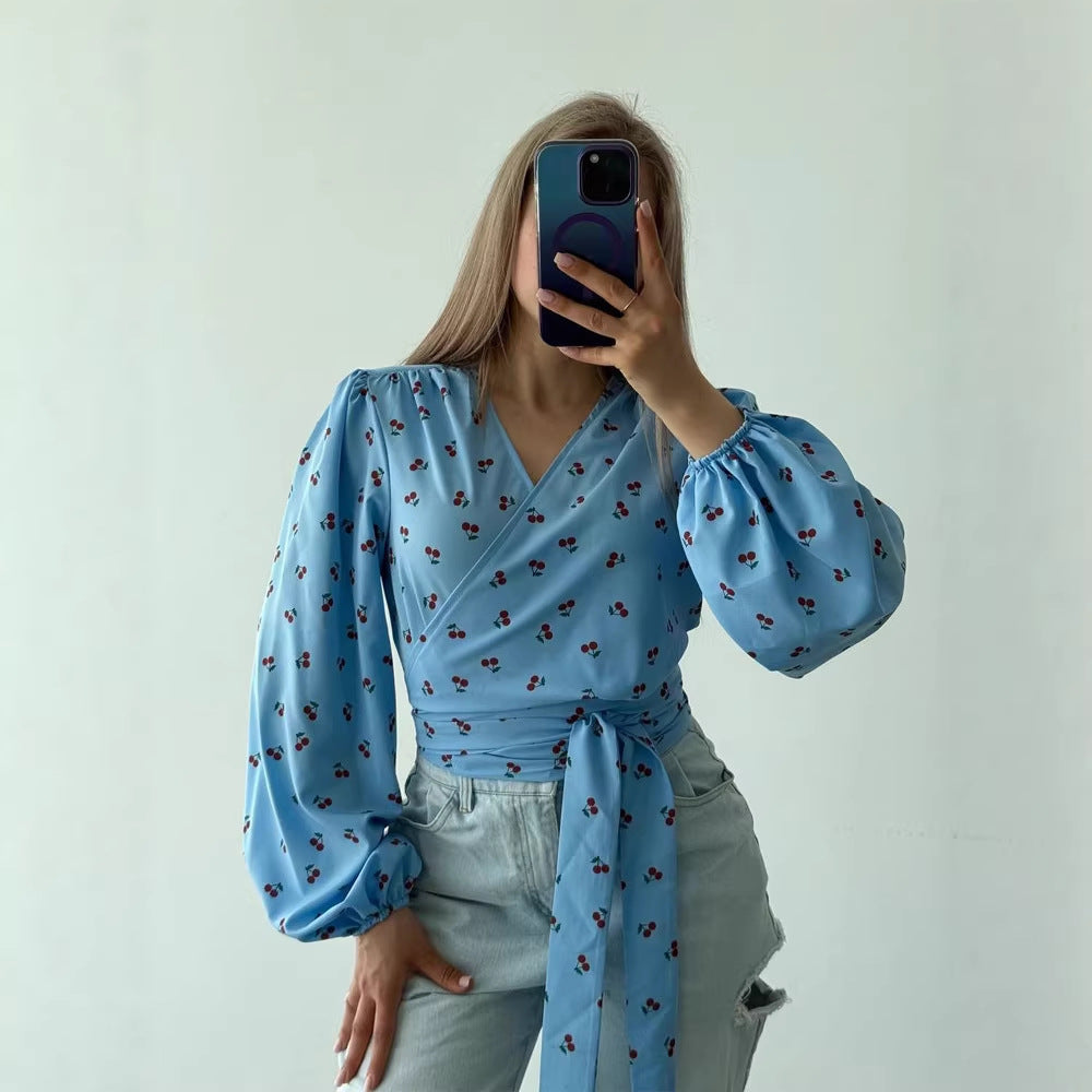 Women's wrap blouse with cherry print, wide puff sleeves & tie belt Amarae