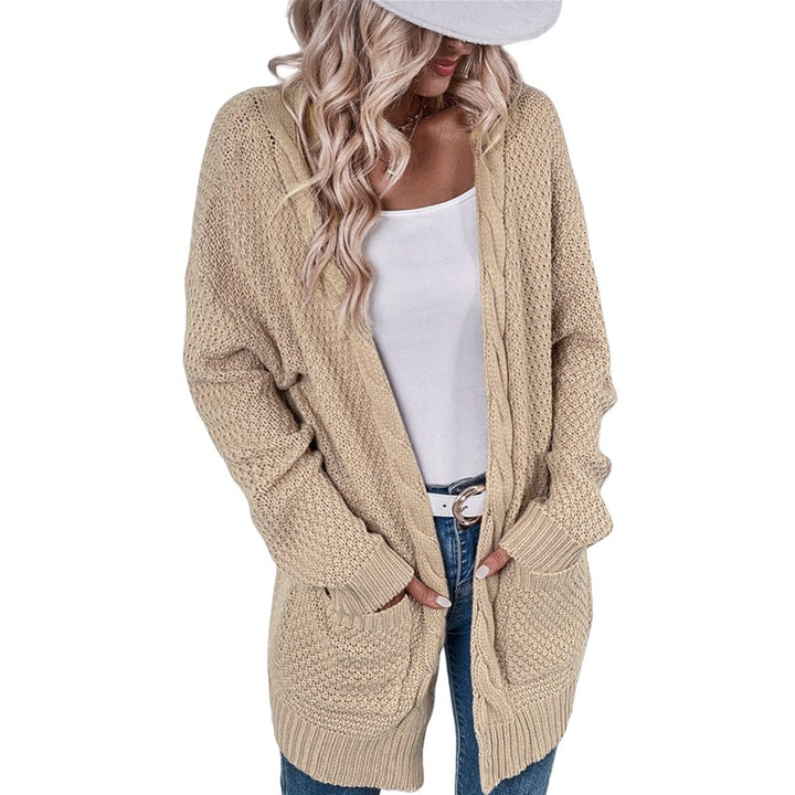 Ladies Large knitted cardigan with an elaborate stitch pattern and practical pockets Lune London