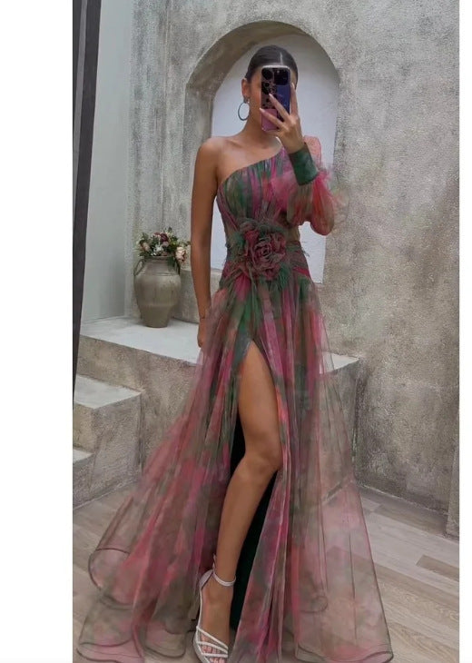 Women's evening dress with asymmetric design and floral accents Lune London