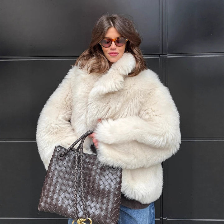 Women's short coat made of voluminous faux fur with a rounded shawl collar and boxy silhouette Amarae