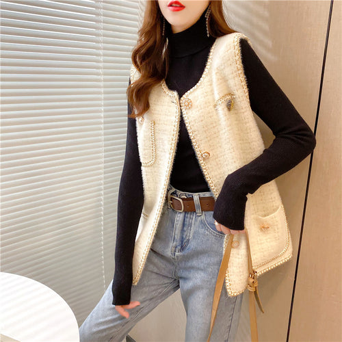 Gilet pour femmes avec des boutons élégants et un design texturé Chic & Stil