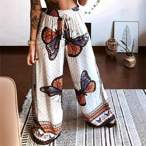 Pleated women's trousers with floral pattern and elastic waistband Amarae