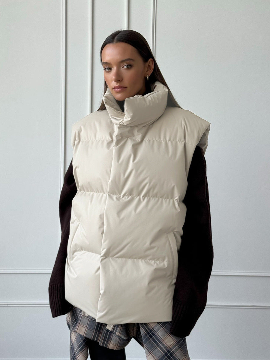 Ladies padded vest with high collar and practical side pockets Lune London