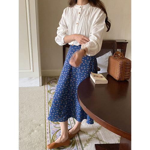 Ladies mid skirt with floral patterns and elegant waistband Chic & Stil