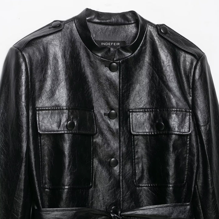 Women's fitted faux leather trench coat with stand-up collar, flapped pockets and tie belt Amarae