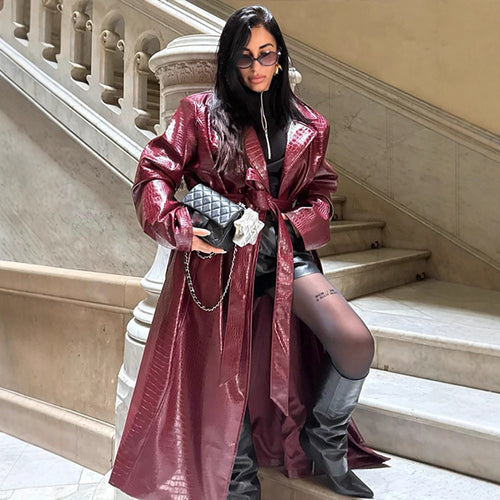Women's long coat made of faux leather with crocodile embossing and waist belt Amarae