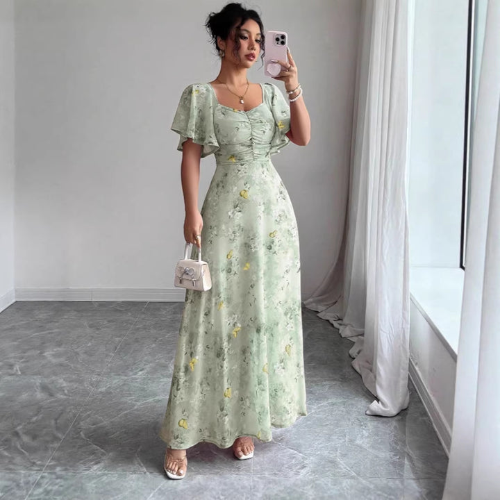 Women's maxi dress with flowing cut and romantic floral pattern Lune London