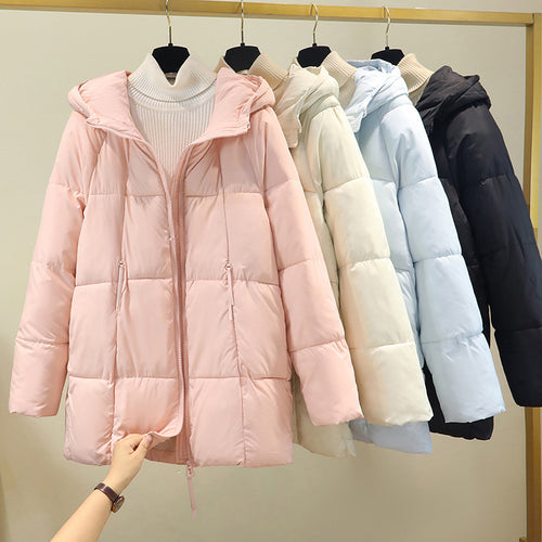 Ladies comfortable and stylish padded jacket with hood and practical zip pockets Amarae