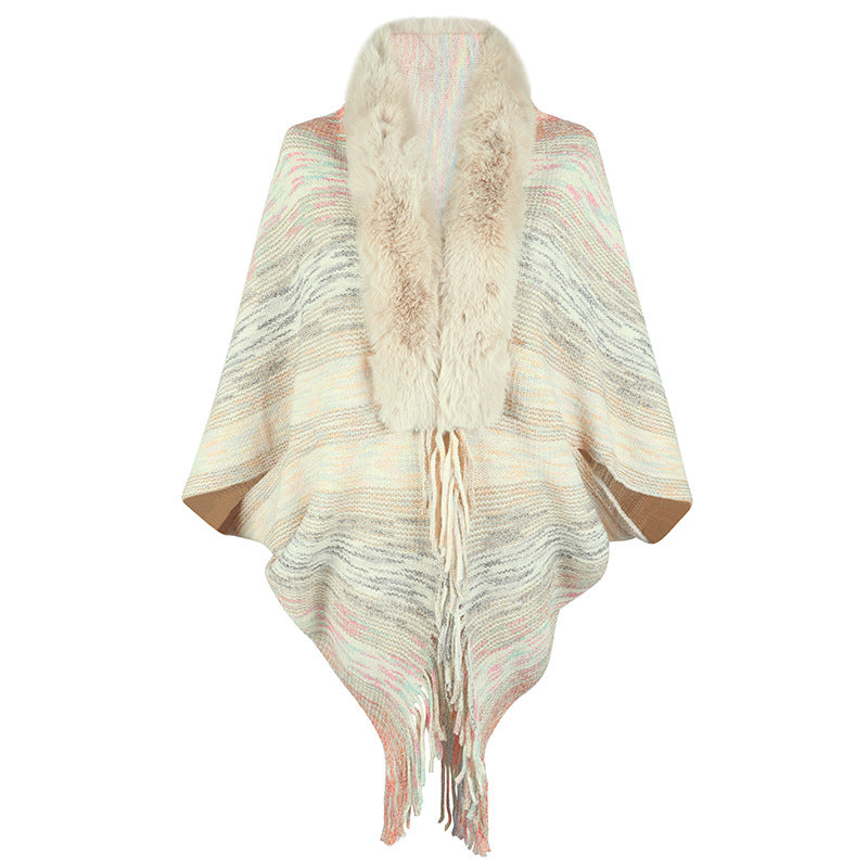 Elegant poncho for ladies with luxurious faux fur collar and fringed hem Lune London
