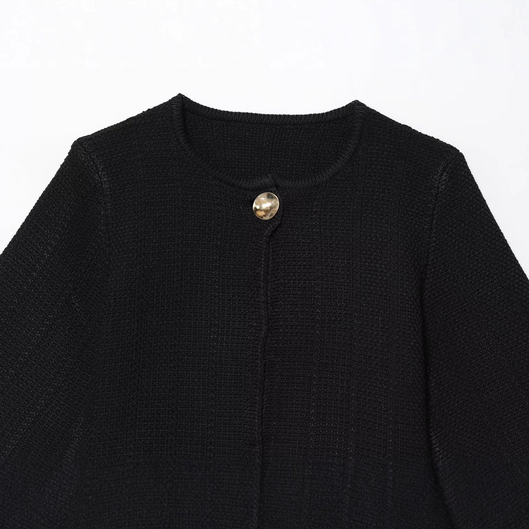 Ladies Elegant Cocoon Jacket with Chic Button Detail and Style