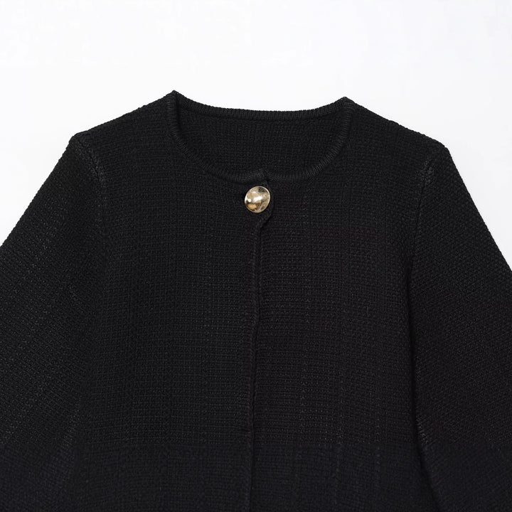 Ladies Elegant Cocoon Jacket with Chic Button Detail and Style