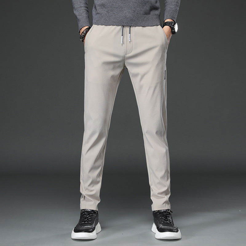 Men's slim fit sports pants with elastic waistband and practical zip pockets Lune London