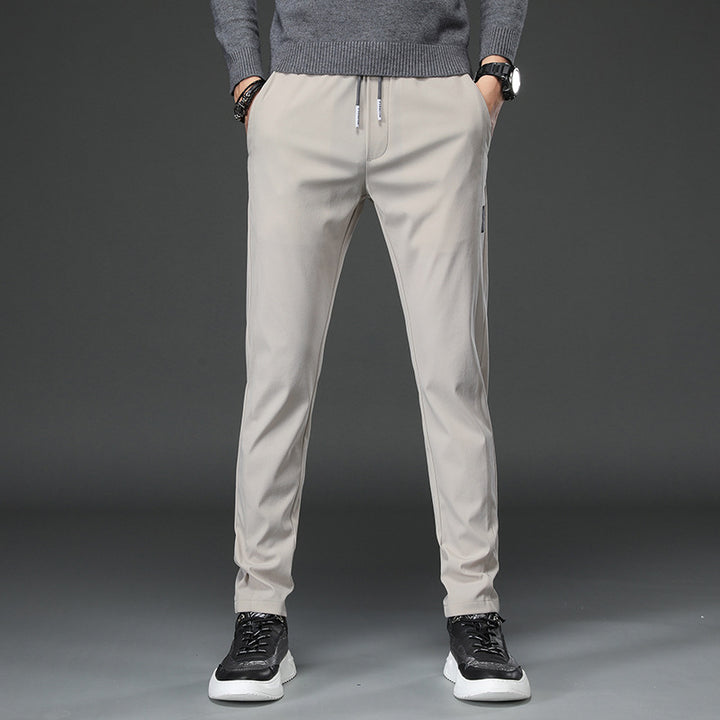 Men's slim fit sports pants with elastic waistband and practical zip pockets Lune London