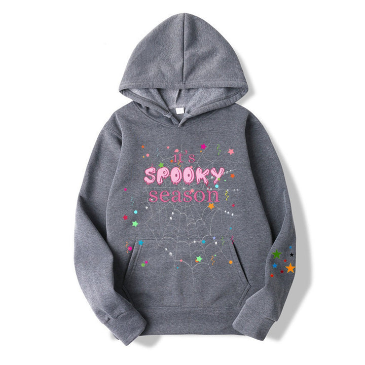 Women cozy hoodie with graphic Halloween design Chic & Stil