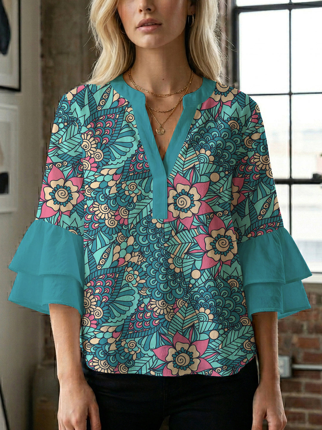 Women's blouse with voluminous ruffle sleeves and creative floral design Lune London