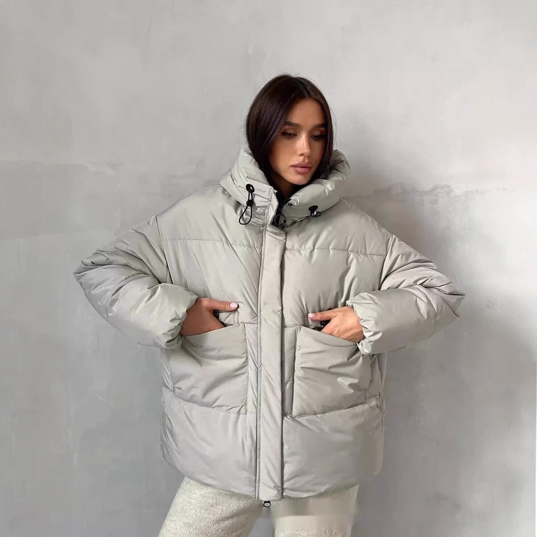 Sporty winter jacket for women with high collar and practical pockets Lune London