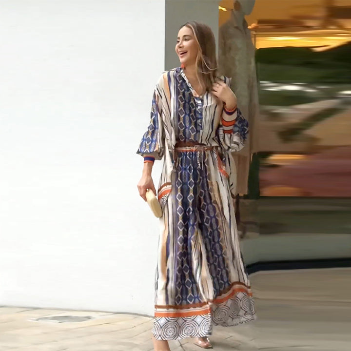 Elegant maxi dress for women with a modern graphic pattern and a fitted bust area Lune London