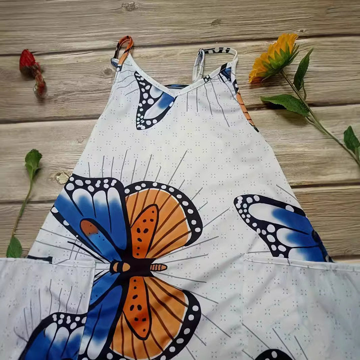 Lady jumpsuit with colorful butterfly pattern and practical pockets Lune London