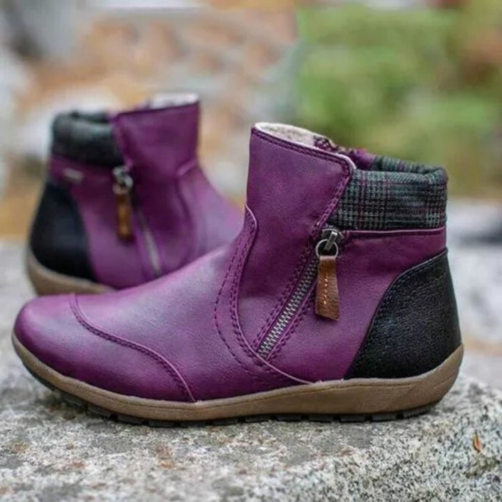 Women's padded boots with side zipper and stylish stitching Lune London