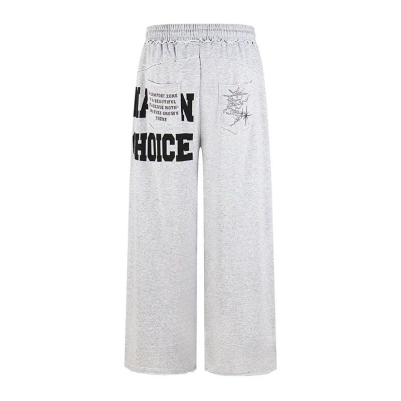 Women's Wide Palazzo Sweatpants with Comfort Waistband, Application Pockets and Typo Print Amarae