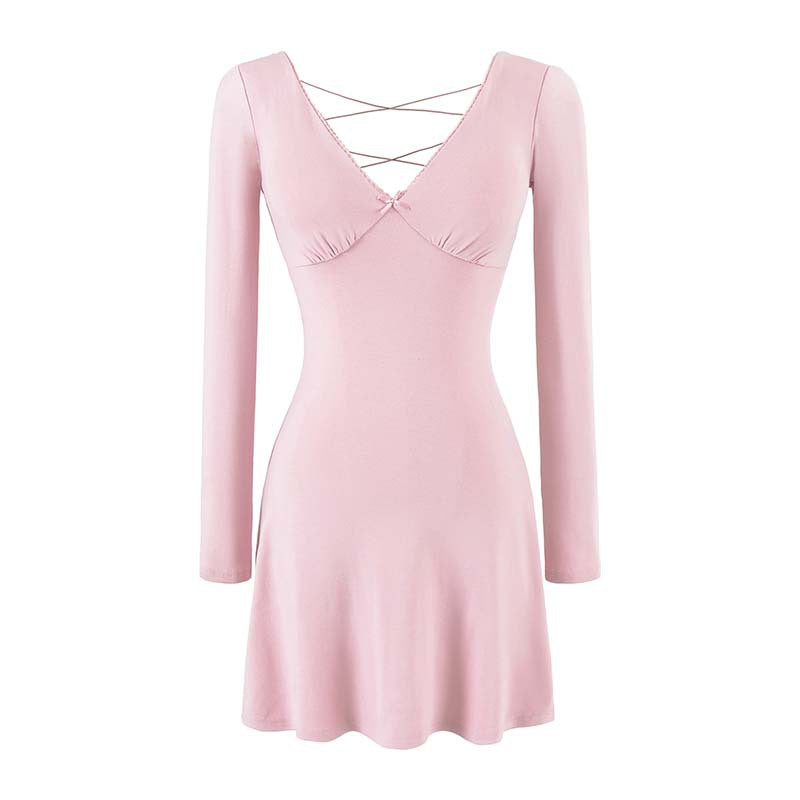 Ladies form-fitting mini dress with a deep V-neckline, gathered bust, and crossed back straps Amarae