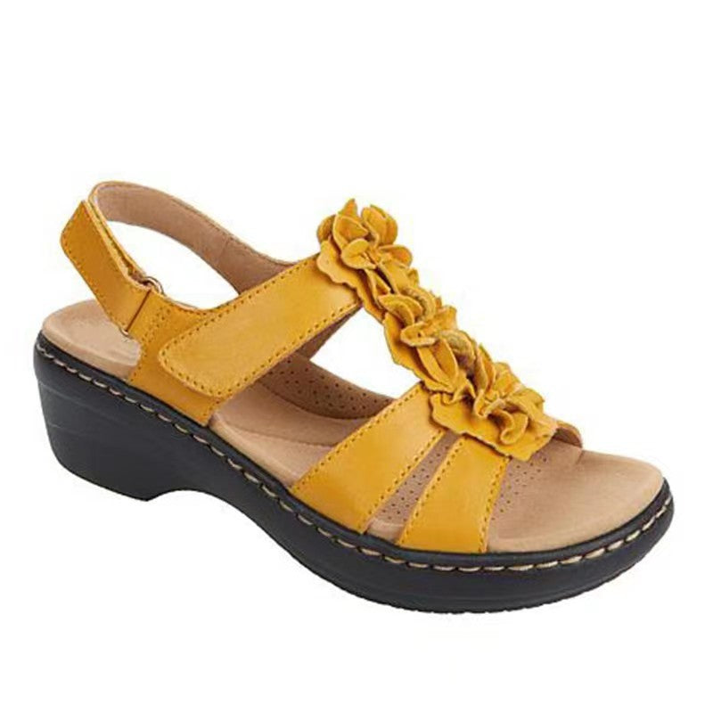 Comfortable wedge heeled sandals for ladies with delicate ruffle details Lune London