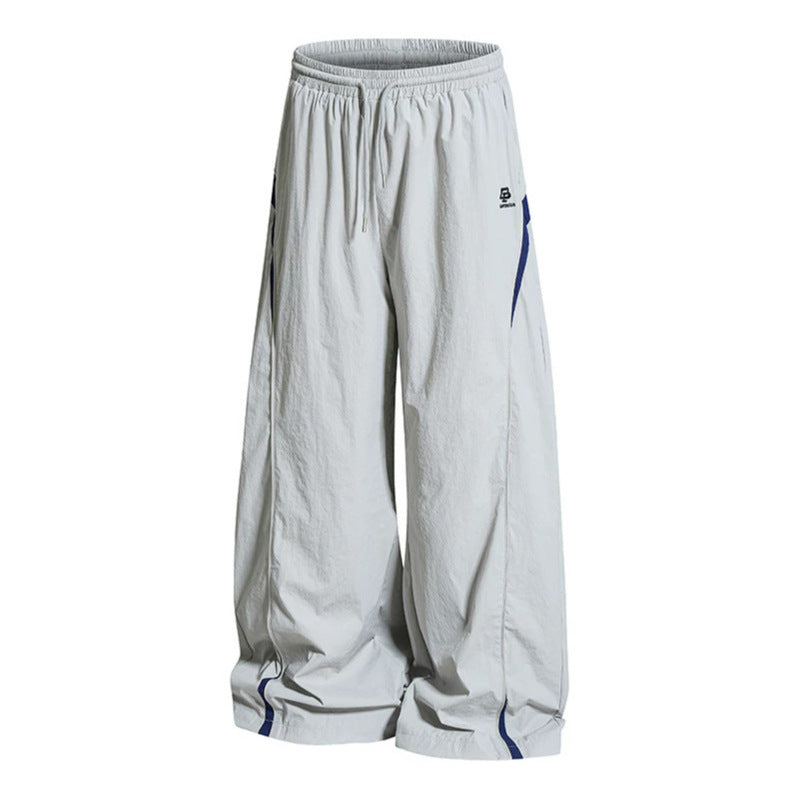 Women Wide Nylon Palazzo Training Pants with Drawstring, Side Contrast Triangles and Adjustable Hem Amarae