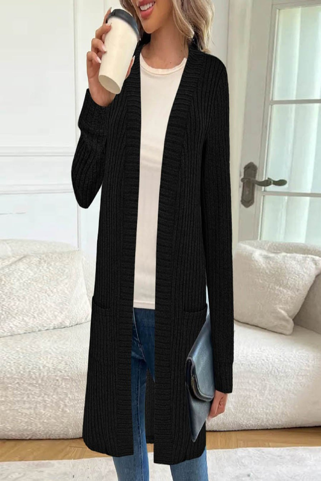 Knitted women's jacket with asymmetrical hem and practical pockets Lune London
