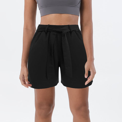 Casual women's pants with elastic waist and side tie belt Amarae