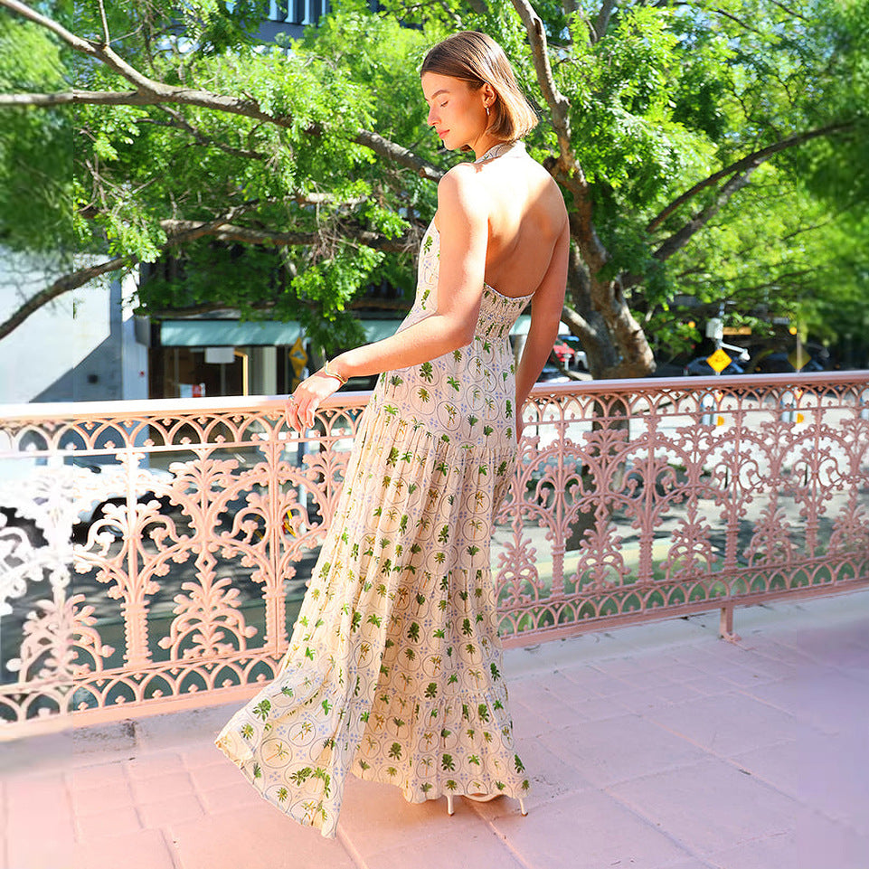 Women’s maxi dress with playful halterneck design and floral pattern mix Lune London