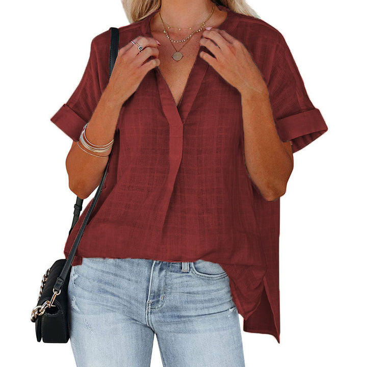 Casual short-sleeve blouse for women with a deep V-neckline and rolled sleeves Lune London