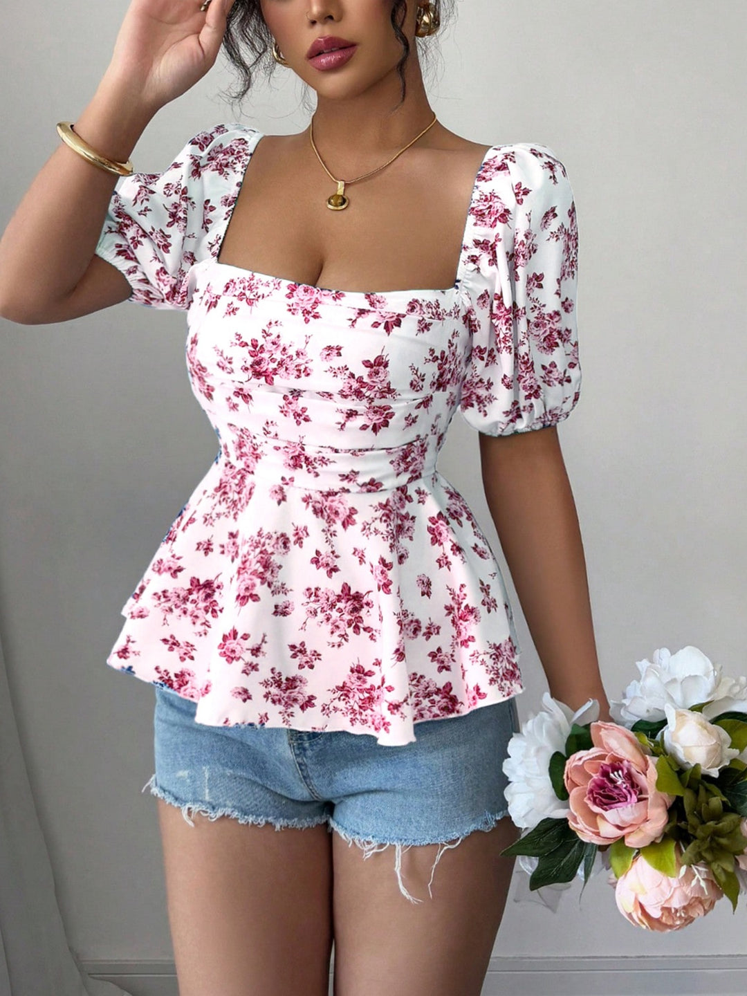 Women’s blouse with ruffle and floral design Lune London