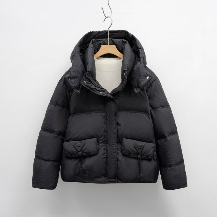 Ladies insulated quilted jacket with practical pockets and hood Lune London