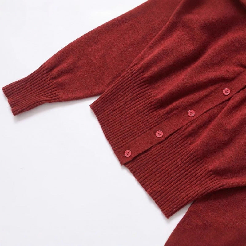 Fashion knitted jacket for women with snap button closure and decorative ruffle detail Lune London