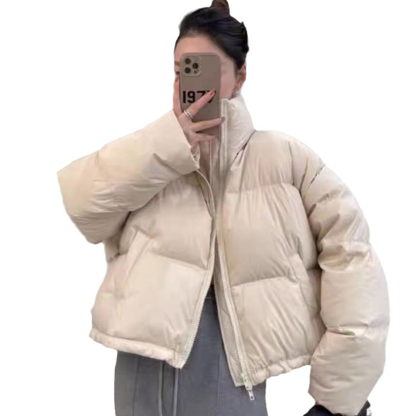 Ladies short functional quilted jacket with high collar and side pockets Amarae