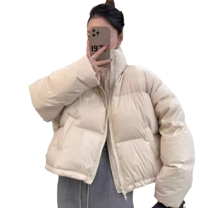 Ladies short functional quilted jacket with high collar and side pockets Amarae