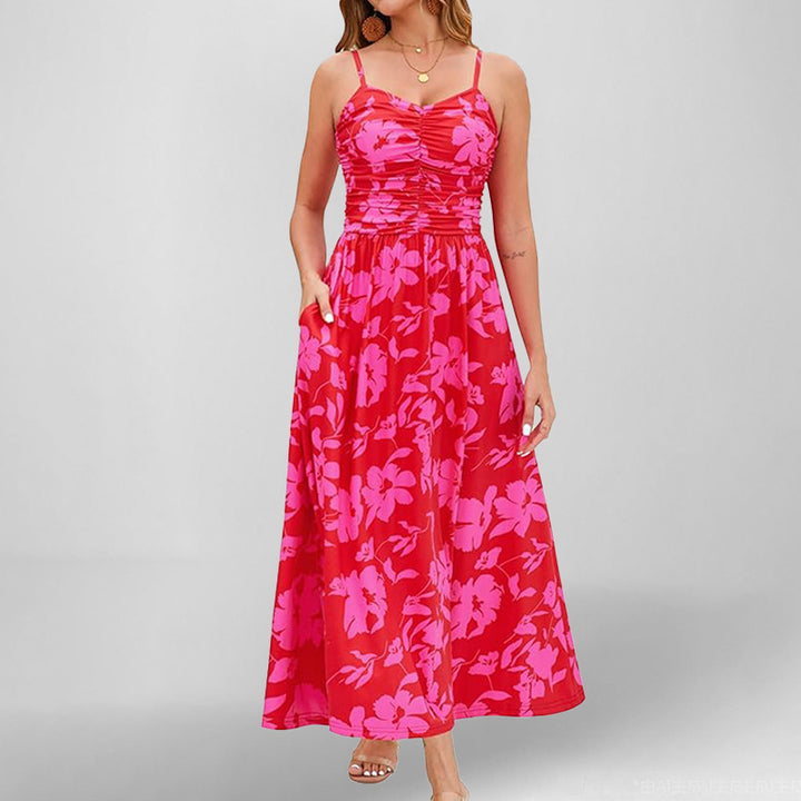 Robe maxi femme avec fines bretelles et poches latérales pratiques Chic & Stil