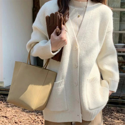 Cardigan féminin confortable avec décolleté en V profond et poches pratiques